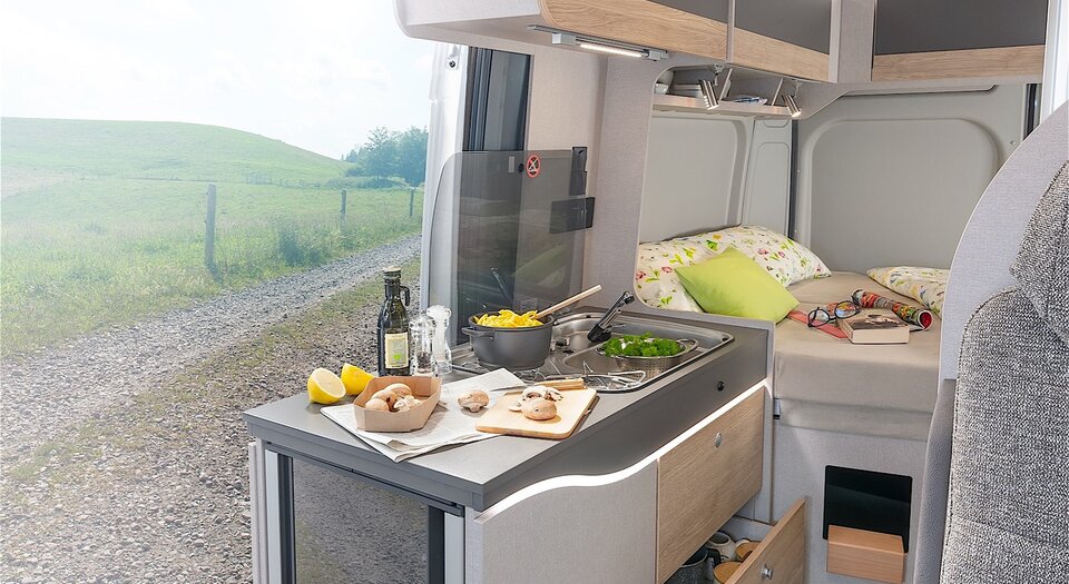 Kitchenette with compressor fridge | Double-hinged to enable easy access from inside and outside the vehicle
